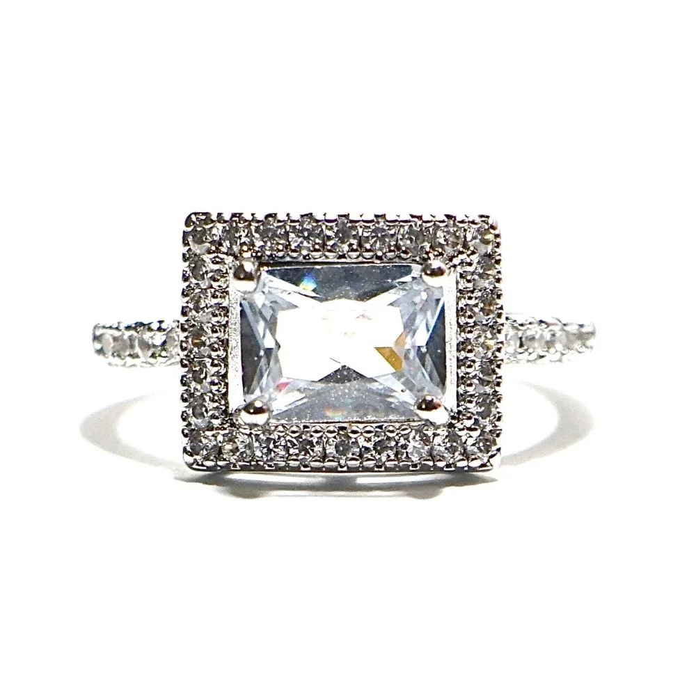 Emerald Inspired White Ring